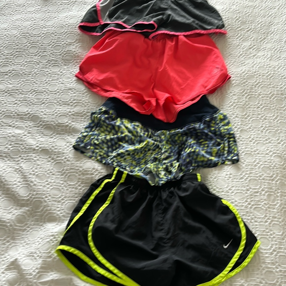 4 pairs of Nike running shorts XS